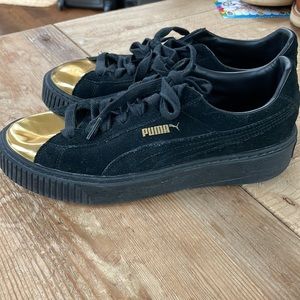 Puma black suede sneakers